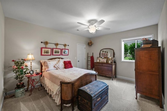 bedroom featuring carpet, baseboards, and ceiling fan