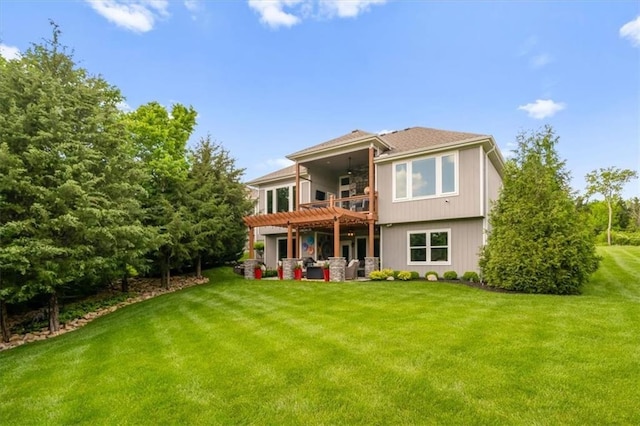 25749 W 96th Ter, Lenexa, KS 66227 - back of house with a balcony, ceiling fan, a pergola, and a yard