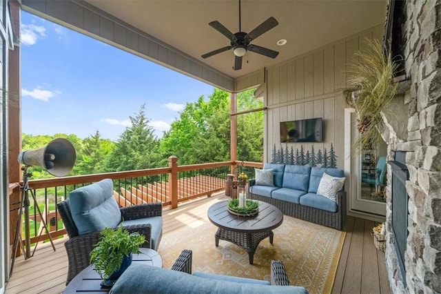 25749 W 96th Ter, Lenexa, KS 66227 - deck with an outdoor living space and a ceiling fan