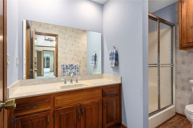 7613 NW Valley Rd, Kansas City, MO 64152 - full bath with toilet, a shower with shower door, and vanity