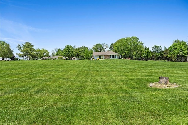 7613 NW Valley Rd, Kansas City, MO 64152 - view of grassy yard featuring a rural view