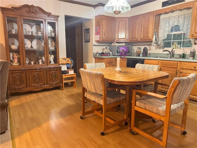 33307 Bittner Dr, Warsaw, MO 65355 - dining area featuring ornamental molding and light wood-style floors