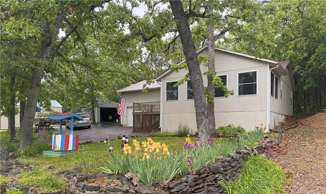 33307 Bittner Dr, Warsaw, MO 65355 - view of home's exterior featuring an outdoor structure