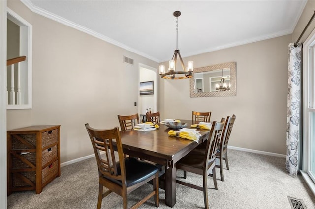 14910 Rhodes Cir, Lenexa, KS 66215 - dining area featuring a chandelier, crown molding, and light colored carpet