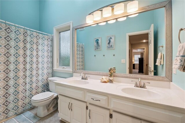 14910 Rhodes Cir, Lenexa, KS 66215 - bathroom with double vanity and a shower with shower curtain