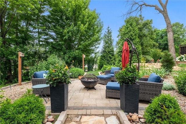 14910 Rhodes Cir, Lenexa, KS 66215 - view of patio featuring an outdoor living space with a fire pit