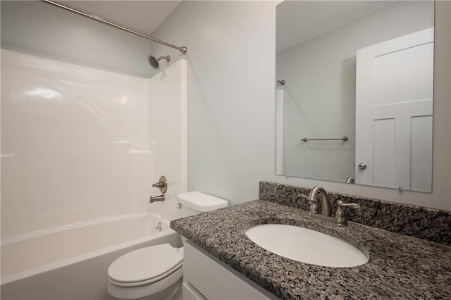 605 Carr St, Knob Noster, MO 65336 - bathroom featuring toilet, vanity, and bathtub / shower combination