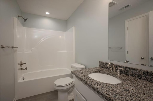 605 Carr St, Knob Noster, MO 65336 - full bath with toilet, vanity, and washtub / shower combination