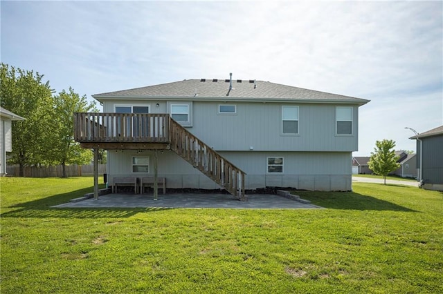 605 Carr St, Knob Noster, MO 65336 - back of property with a patio, a wooden deck, a yard, and stairs