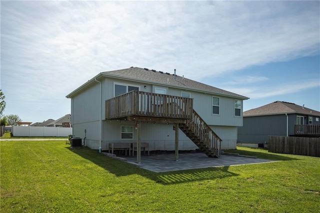 605 Carr St, Knob Noster, MO 65336 - back of house featuring a patio, a deck, stairs, and central air condition unit