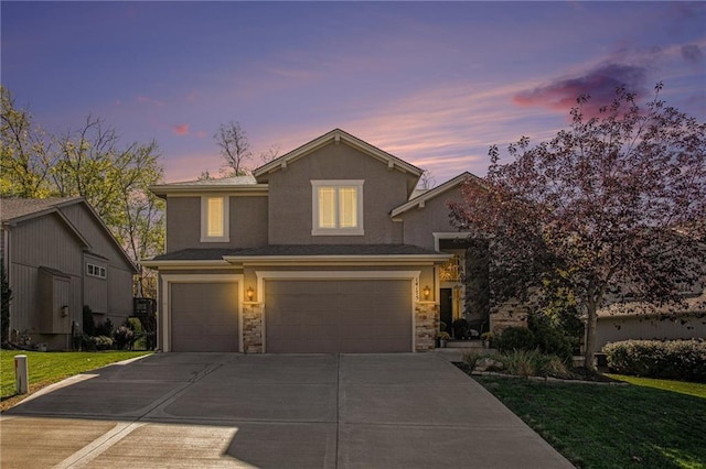 14175 NW 68th St, Kansas City, MO 64152 - view of front of house with an attached garage, driveway, a front lawn, stucco siding, and stone siding
