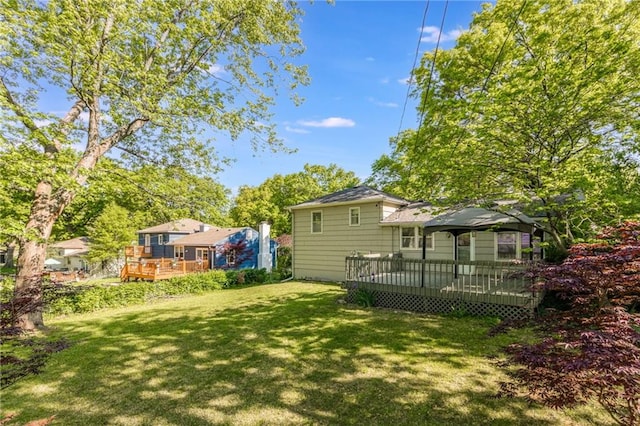 5707 W 101st Ter, Overland Park, KS 66207 - rear view of property with a deck and a yard