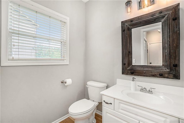 15951 S Avalon St, Olathe, KS 66062 - half bathroom with toilet, vanity, and baseboards