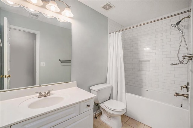 15951 S Avalon St, Olathe, KS 66062 - bathroom featuring vanity, toilet, tile patterned flooring, and shower / bath combo with shower curtain