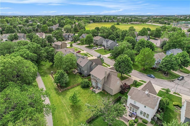 15951 S Avalon St, Olathe, KS 66062 - aerial perspective of suburban area with a tree filled landscape