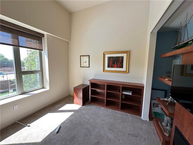 4950 Central St Unit 102, Kansas City, MO 64112 - carpeted bedroom featuring baseboards