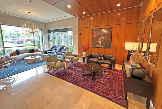 4950 Central St Unit 102, Kansas City, MO 64112 - community lobby with wood walls and recessed lighting