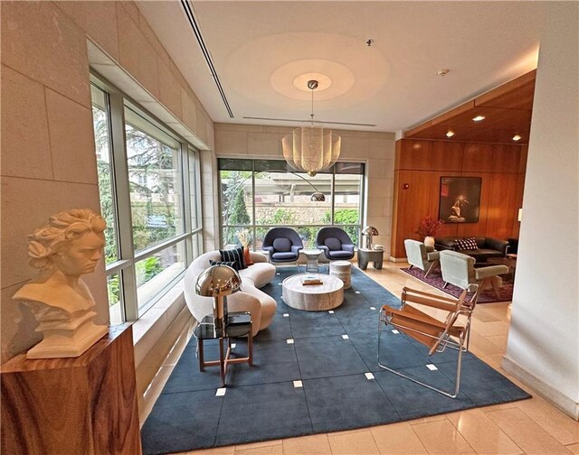 4950 Central St Unit 102, Kansas City, MO 64112 - interior space with tile patterned flooring and a chandelier