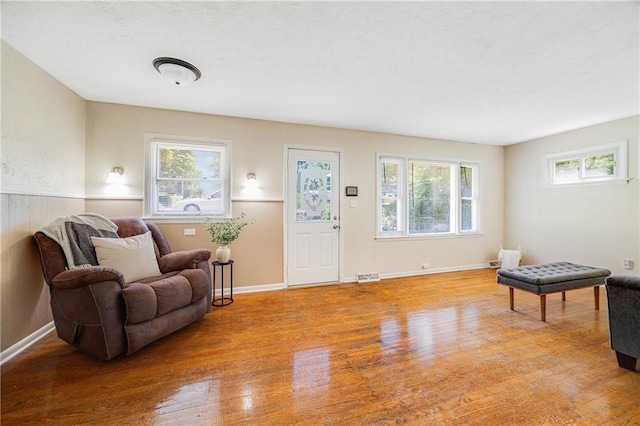 6132 N Eugene Field Rd, Kansas City, MO 64119 - sitting room with wood finished floors and baseboards