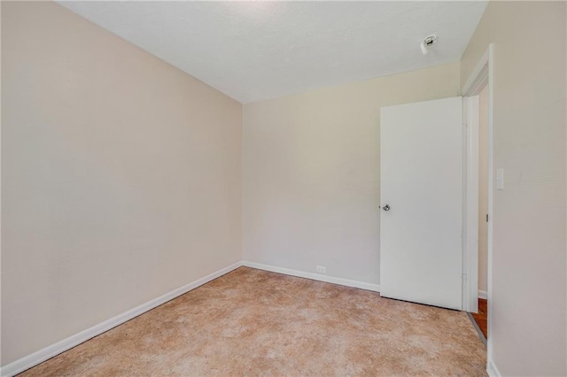 6132 N Eugene Field Rd, Kansas City, MO 64119 - unfurnished room with baseboards and carpet flooring