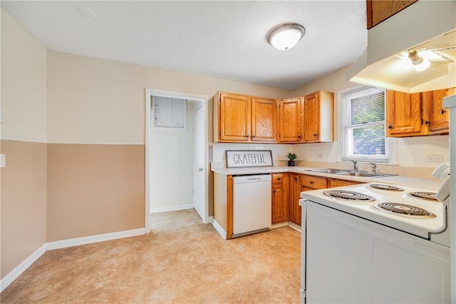 6132 N Eugene Field Rd, Kansas City, MO 64119 - kitchen with white appliances, a sink, under cabinet range hood, light countertops, and light colored carpet