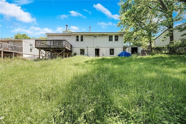 6132 N Eugene Field Rd, Kansas City, MO 64119 - rear view of property with a deck