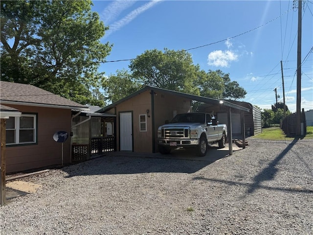 112 N Burns St N, Independence, KS 67301 - view of property exterior with driveway and a shingled roof