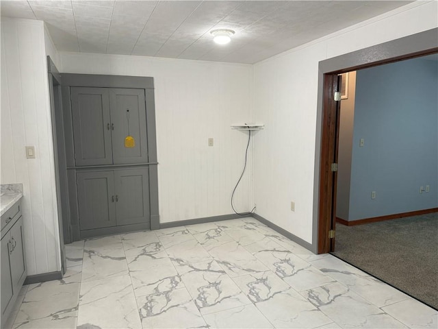 112 N Burns St N, Independence, KS 67301 - unfurnished room with baseboards and light marble finish flooring