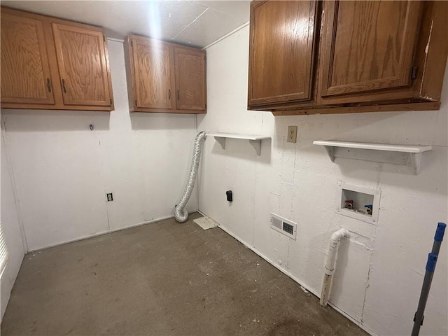 112 N Burns St N, Independence, KS 67301 - laundry room with cabinet space and washer hookup