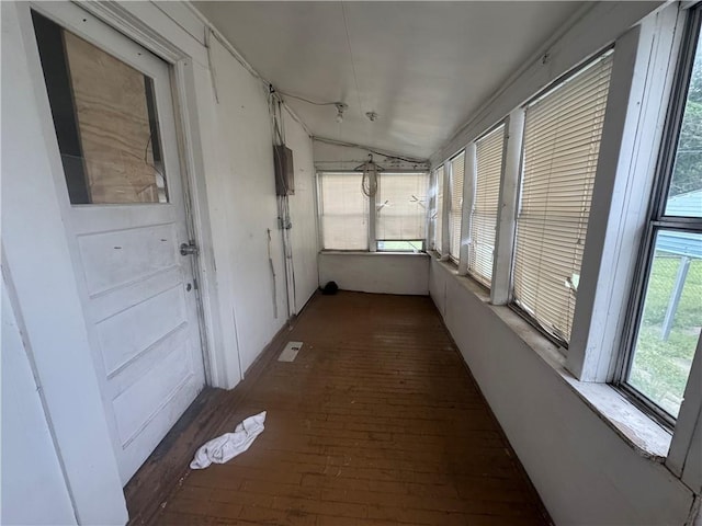 231 Osage St, Leavenworth, KS 66048 - corridor with hardwood / wood-style flooring, vaulted ceiling, and electric panel