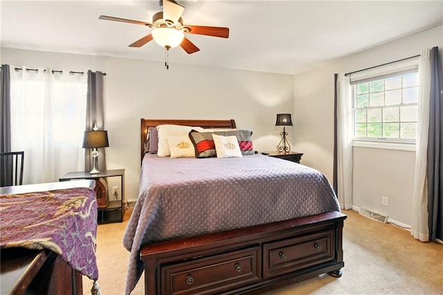 802 High Dr, Excelsior Springs, MO 64024 - bedroom featuring light colored carpet, a ceiling fan, and baseboards