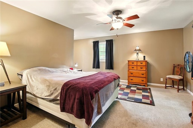 802 High Dr, Excelsior Springs, MO 64024 - carpeted bedroom featuring baseboards and ceiling fan