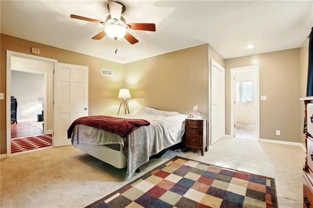 802 High Dr, Excelsior Springs, MO 64024 - carpeted bedroom featuring baseboards and a ceiling fan