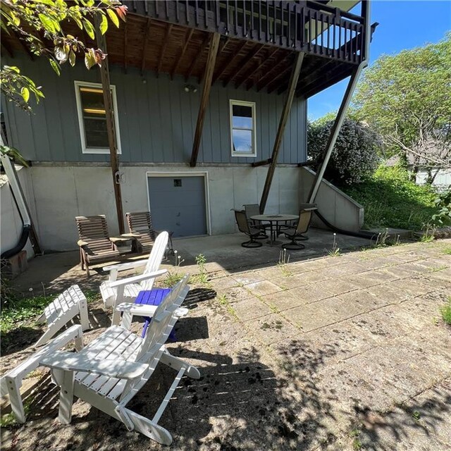802 High Dr, Excelsior Springs, MO 64024 - rear view of property featuring a patio area and a deck