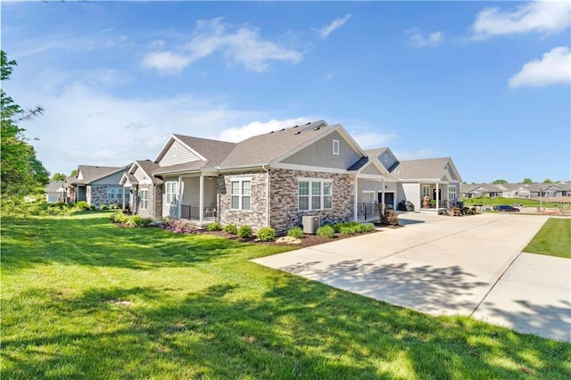 11961 S Tallgrass Dr Unit 403, Olathe, KS 66061 - craftsman inspired home with a front lawn, a residential view, and central AC unit