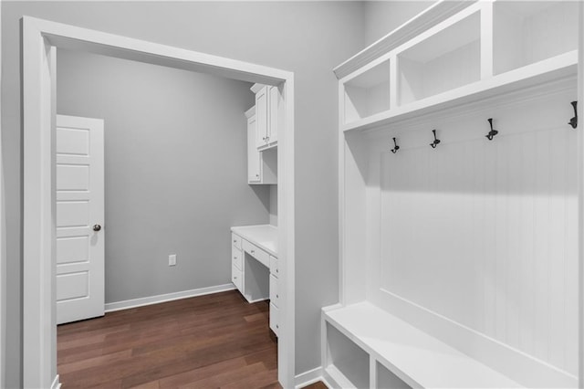 11961 S Tallgrass Dr Unit 403, Olathe, KS 66061 - mudroom with dark wood-style flooring, built in study area, and baseboards
