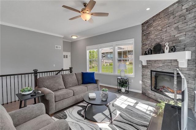 11961 S Tallgrass Dr Unit 403, Olathe, KS 66061 - living area featuring ceiling fan, wood finished floors, a fireplace, ornamental molding, and baseboards