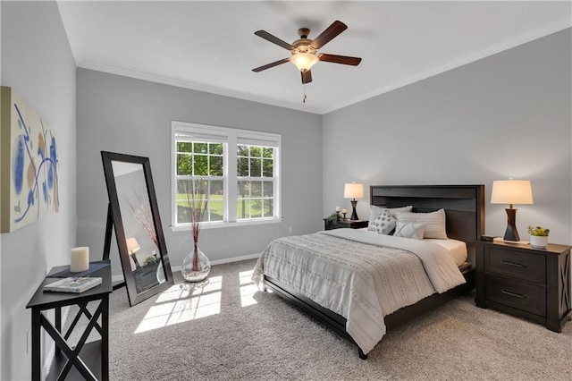 11961 S Tallgrass Dr Unit 403, Olathe, KS 66061 - bedroom with light carpet, ornamental molding, ceiling fan, and baseboards