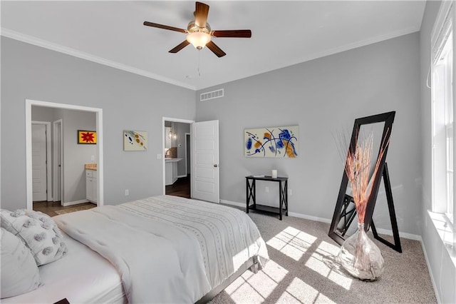 11961 S Tallgrass Dr Unit 403, Olathe, KS 66061 - bedroom with crown molding, baseboards, light carpet, a ceiling fan, and ensuite bathroom