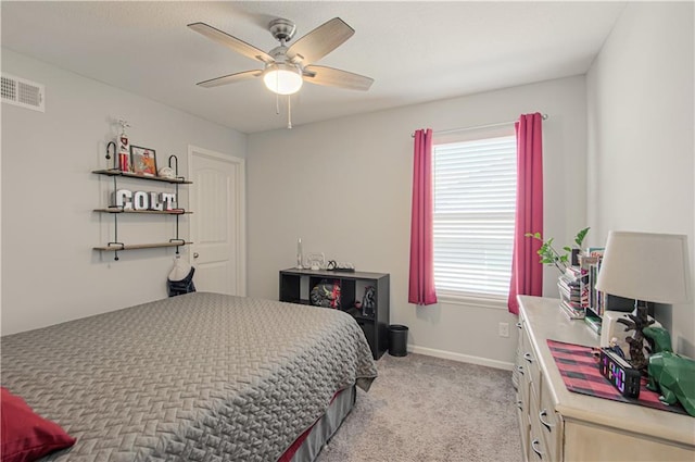11021 N Oxford Ave, Kansas City, MO 64157 - bedroom with light carpet, a ceiling fan, and baseboards
