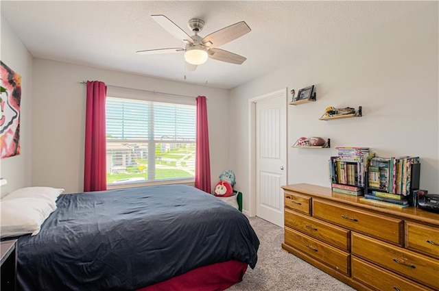 11021 N Oxford Ave, Kansas City, MO 64157 - carpeted bedroom with a ceiling fan