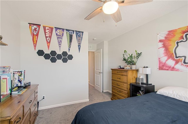 11021 N Oxford Ave, Kansas City, MO 64157 - carpeted bedroom with baseboards and a ceiling fan