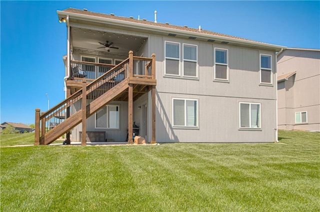 11021 N Oxford Ave, Kansas City, MO 64157 - rear view of property with a ceiling fan, stairway, a yard, and a wooden deck