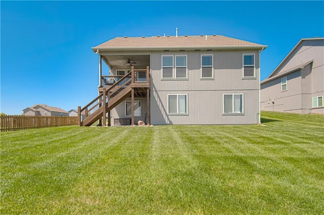 11021 N Oxford Ave, Kansas City, MO 64157 - back of house with stairs, a ceiling fan, and a wooden deck