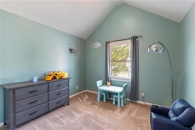 7703 NE 74th Ter, Kansas City, MO 64158 - recreation room featuring light carpet and vaulted ceiling