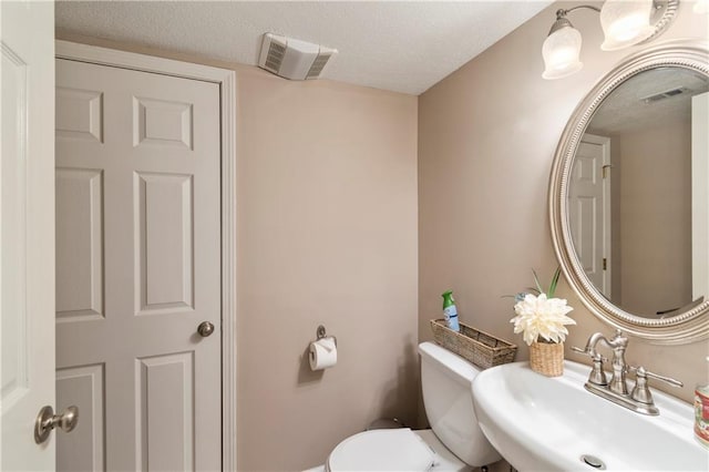 7703 NE 74th Ter, Kansas City, MO 64158 - half bath featuring a sink and toilet