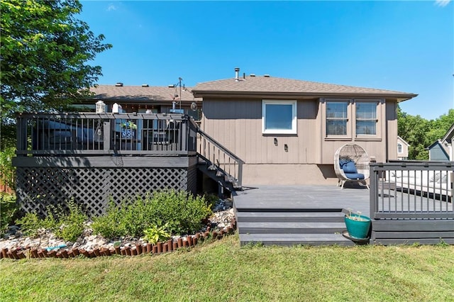 7703 NE 74th Ter, Kansas City, MO 64158 - rear view of house featuring a deck and a yard