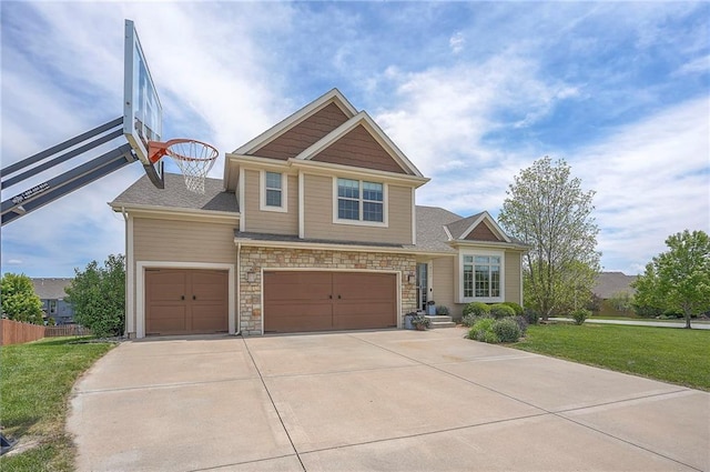10111 N Tullis Dr, Kansas City, MO 64157 - craftsman house with a garage, concrete driveway, and stone siding
