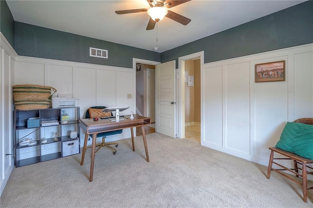 10111 N Tullis Dr, Kansas City, MO 64157 - office space featuring a decorative wall, a ceiling fan, and light carpet