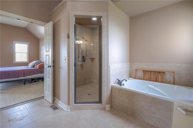 10111 N Tullis Dr, Kansas City, MO 64157 - ensuite bathroom featuring a shower stall, tile patterned floors, and a bath